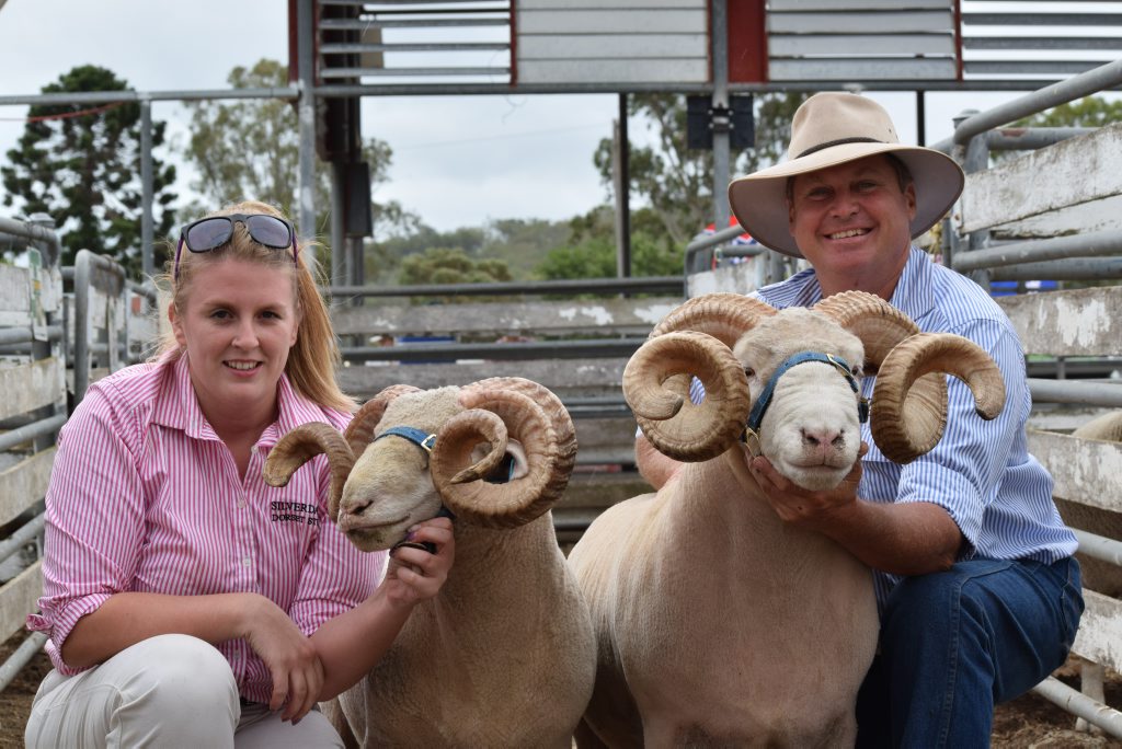 Tracey Bennett and Lyndon Frey from Inglewood with their winning dorset horn rams at the Allora Show.